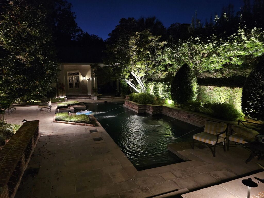 Landscape Lighting around a pool can improve safety and create a visually captivating area