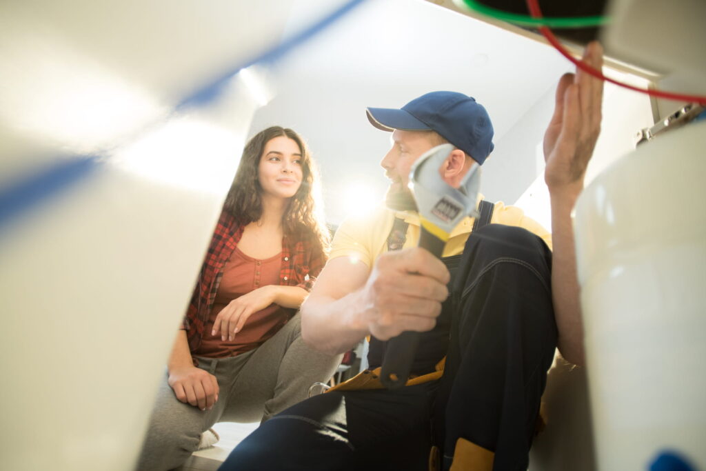plumber explaining reason of clogged drains plumber-explaining-reason-of-clogged-drains