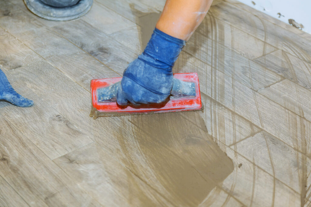 Transform Your Home in Days with Top Flooring Pros 3 Grouting a floor