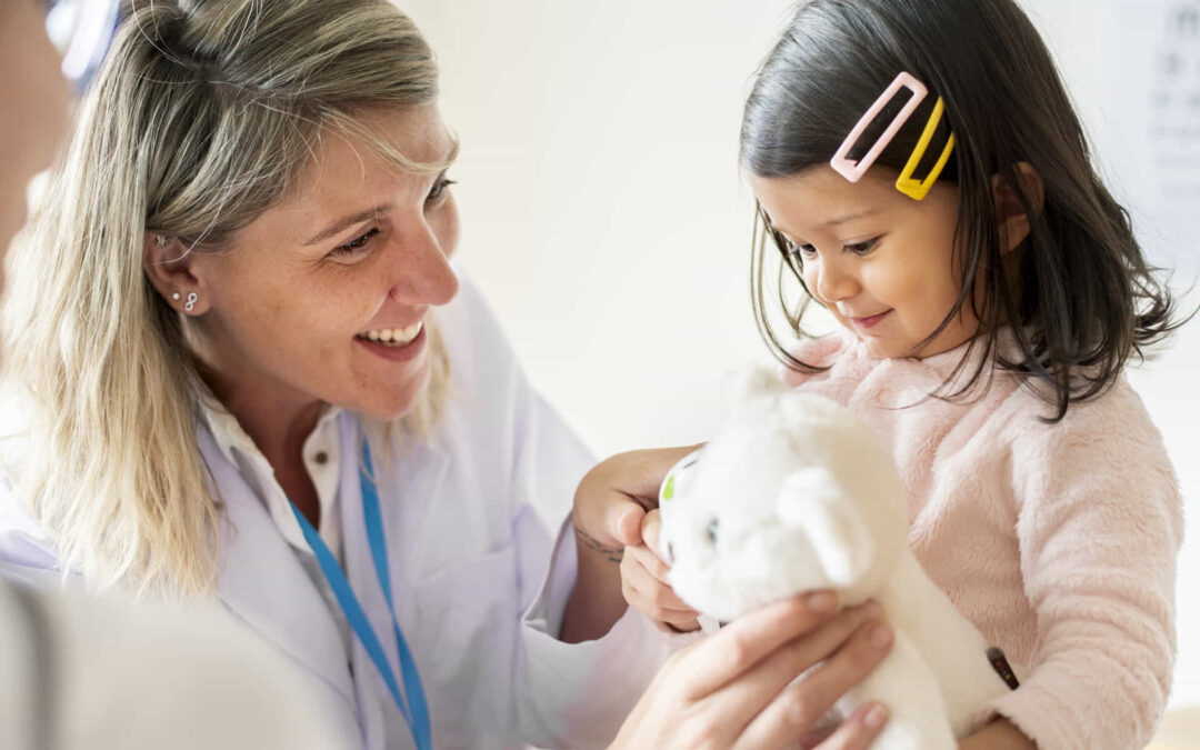 pediatrician with patient
