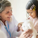 pediatrician with patient