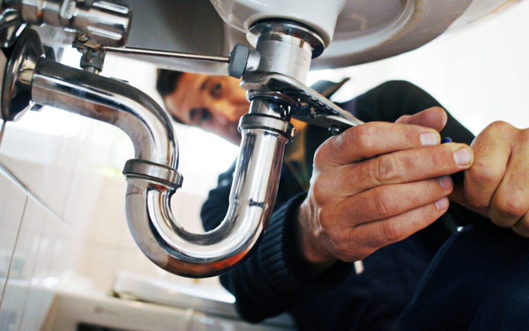 plumber-repairing-sink
