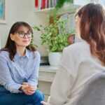 female-counselor-working-with-young adult