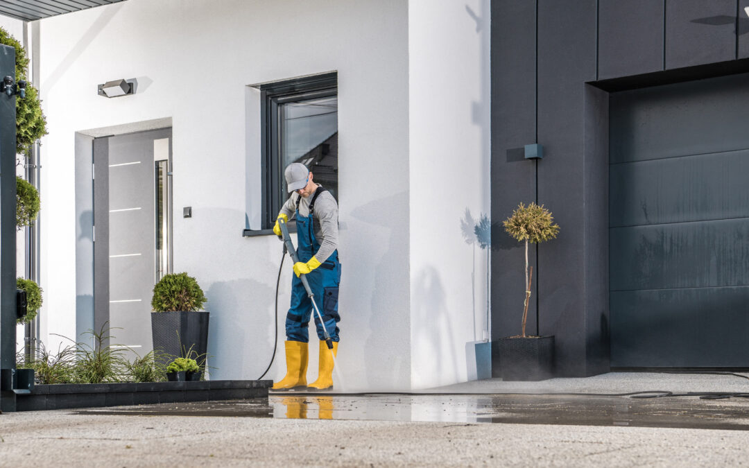 Professional Pressure Washing a driveway